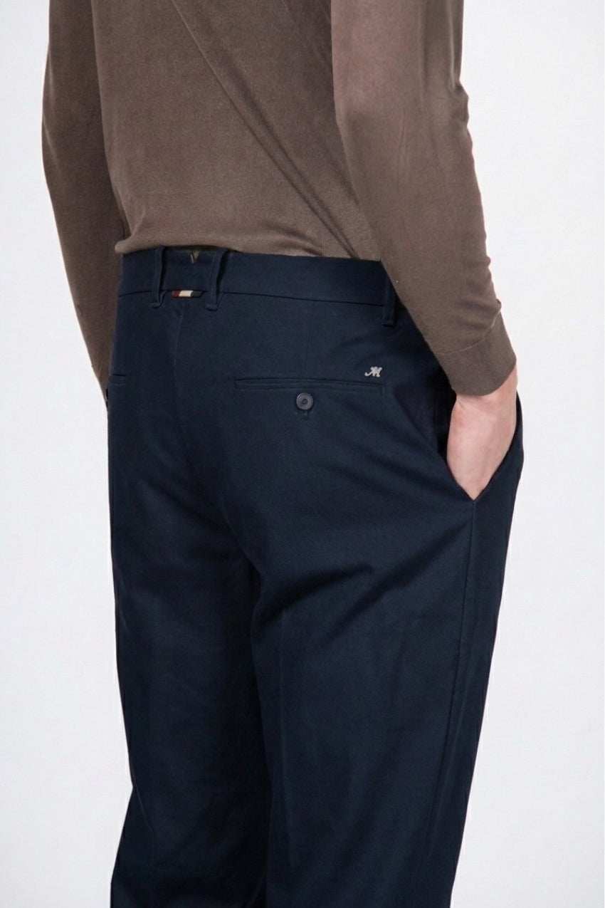 Paris men’s chino pants in stretch tricotine with carrot fit ①