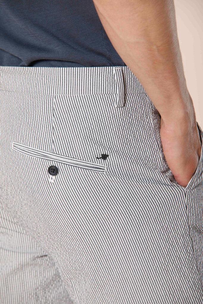 Image 4 of men's seersucker chino pants with navy blue stripe in carrot fit Osaka 1 Pinces model by Mason's